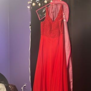 I wore it once to prom and never wore it again. Size 16, almost brand new!